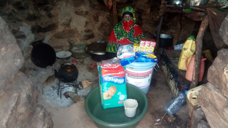 A traditional family dwelling in Socotra where the woman of the house has received a hygiene pack